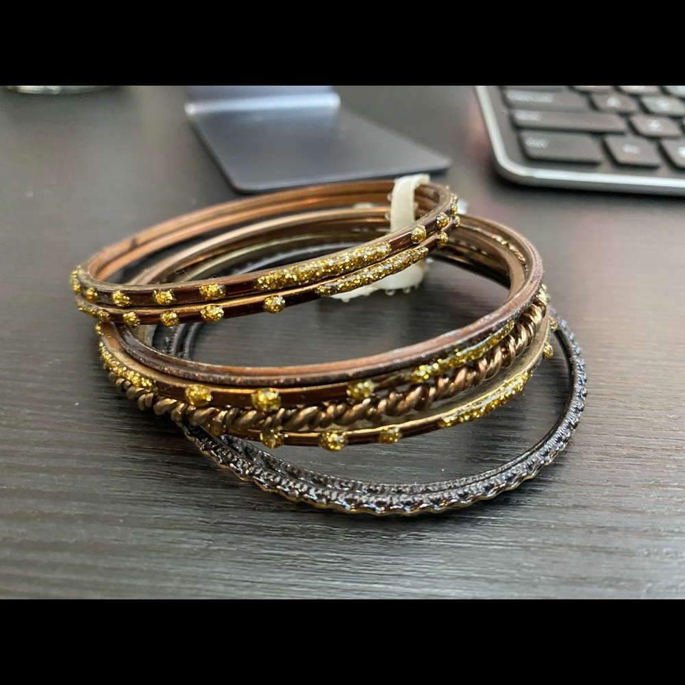 Silver and gold bangle bracelets